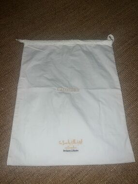 White Drawstring Laundry Bag with Gold Embroidery